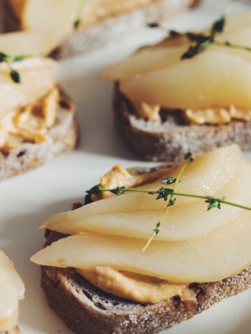 smoked cashew cheese toast with poached pear & fried thyme_hot for food