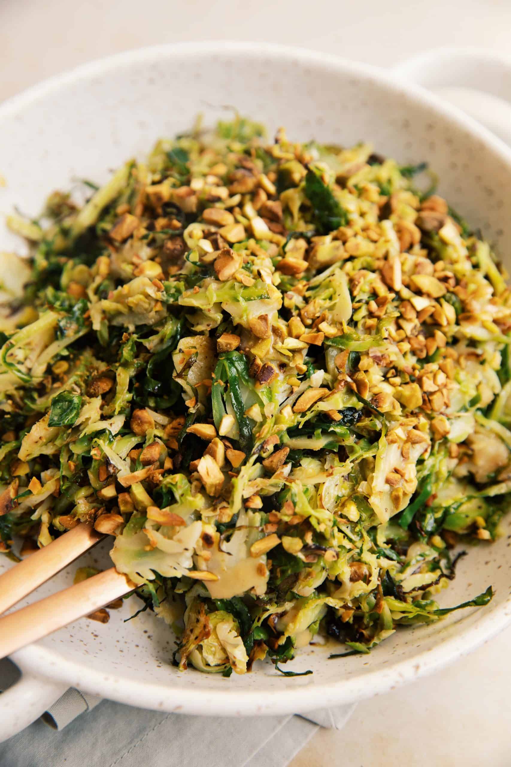 diners view of a large bowl of shaved brussels salad
